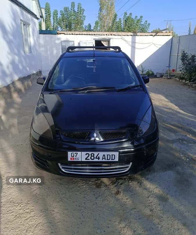 Mitsubishi Colt 2003, Талас