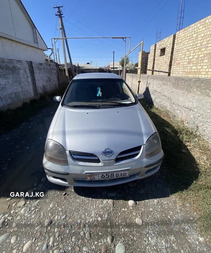 Nissan Almera Tino 2001, Тюп