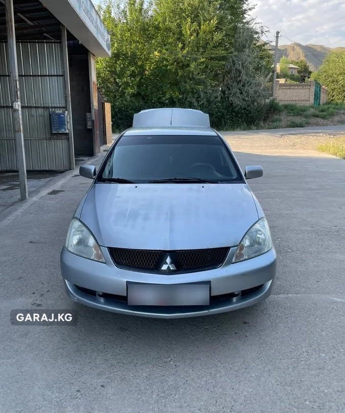 Mitsubishi Lancer 2006, Таш-Кумыр